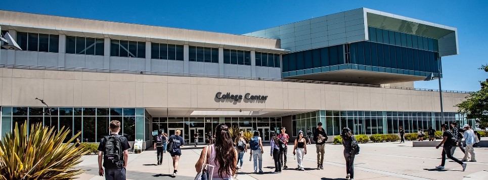 People walking around a college campus