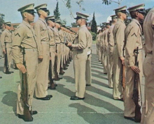Marines standing at attention during final inspection