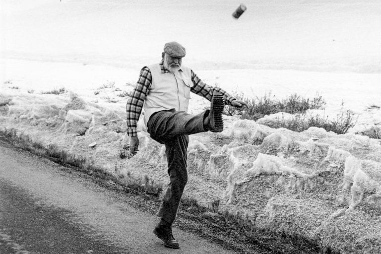 Hemmingway kicking a can in the snow