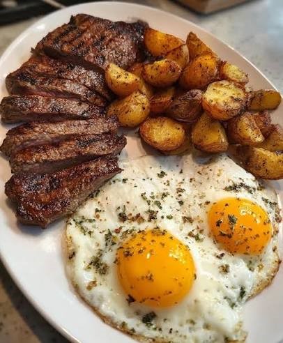 A breakfast of steak and eggs